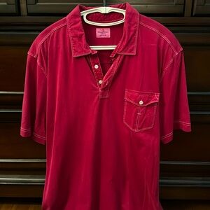 Tommy bahama men’s polo. Size is XL. Color is raspberry or wine.
